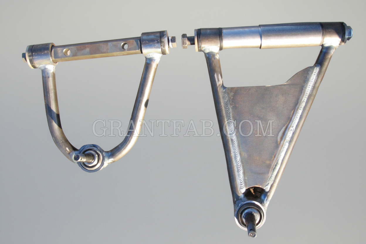A metal control arm for a vehicle's suspension system, branded with the Cando logo, indicating it is for a Mazda/toyota spindle.