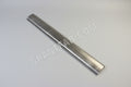 A gray steel rollpan designed for a Toyota Tacoma truck.