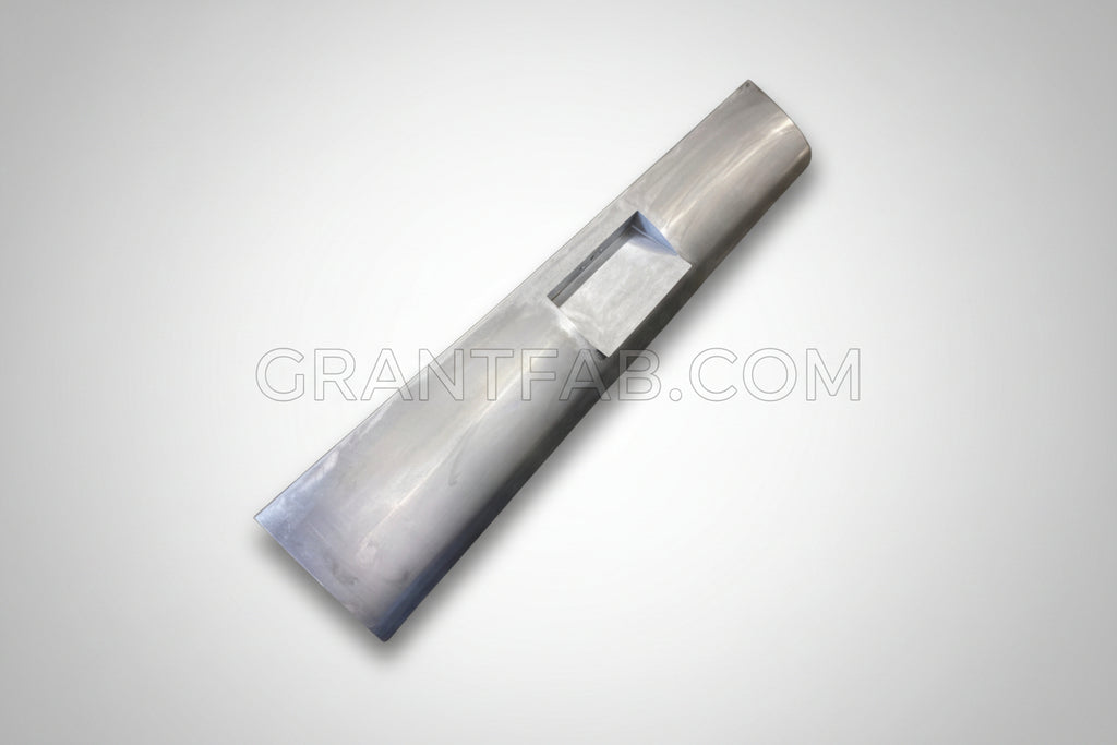 A silver aftermarket roll pan for a vehicle, designed to fit a Chevrolet Avalanche, with a light integrated in the center box area.