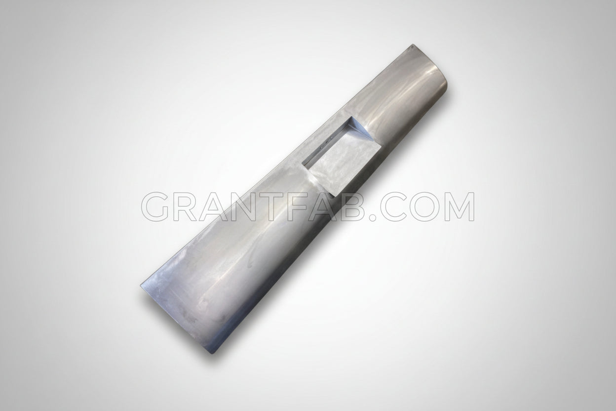 A silver aftermarket roll pan for a vehicle, designed to fit a Chevrolet Avalanche, with a light integrated in the center box area.