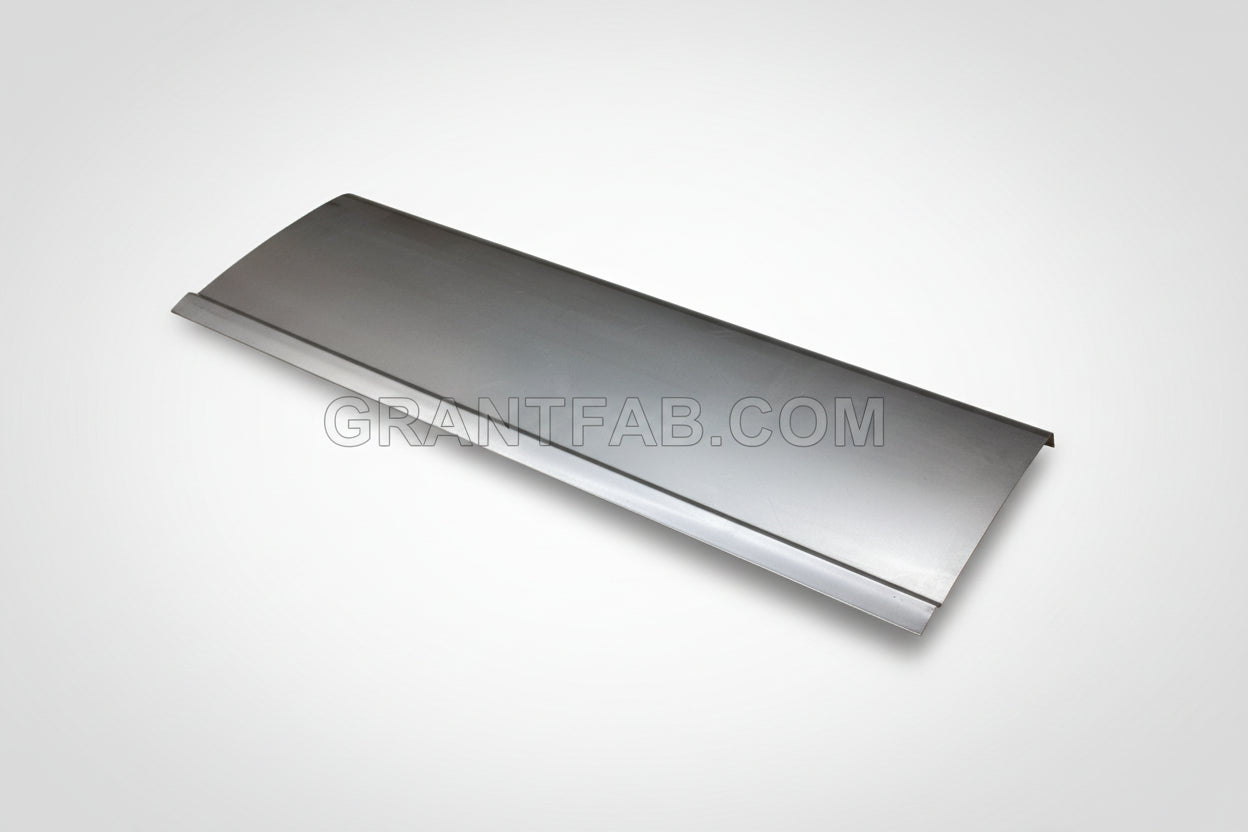 A sheetmetal tailgate skin for a Toyota pickup truck, displayed on a plain background.