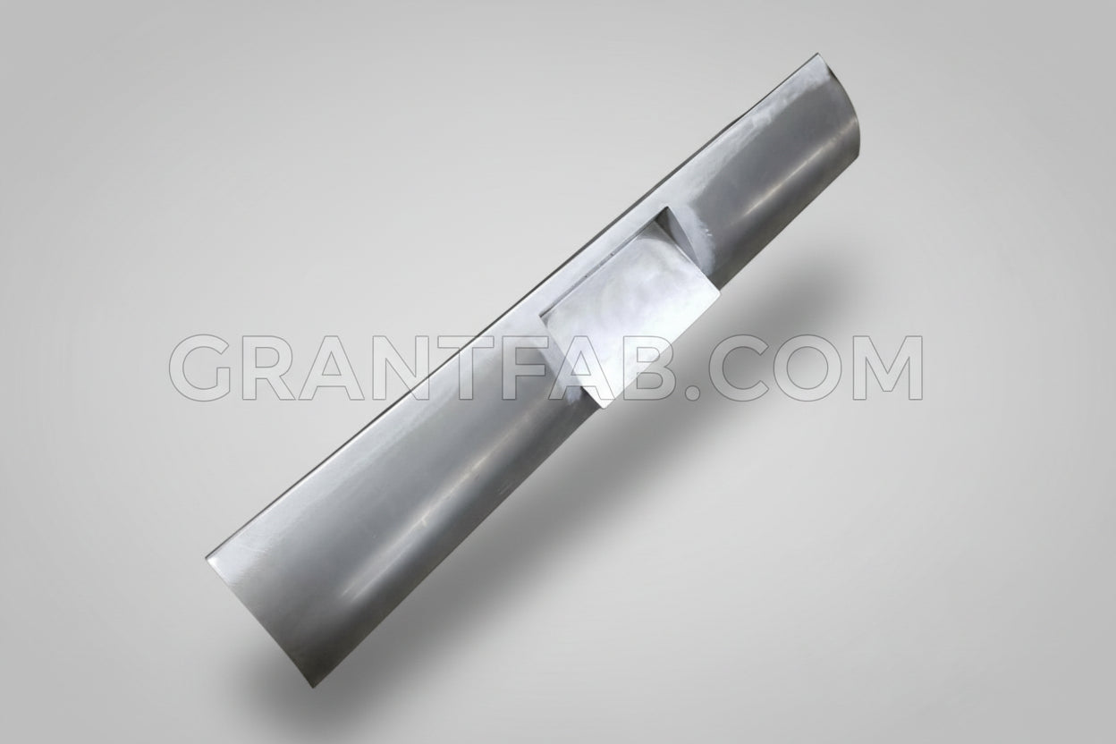 A silver-colored metal rollpan for a vehicle, with a curved shape designed to fit the bed of a pickup truck.
