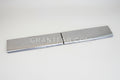A silver 2 piece front rollpan for a 81-87 Chevy C-10 vehicle.