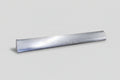 A silver-colored metal roll pan for a Toyota vehicle, displayed against a black background.