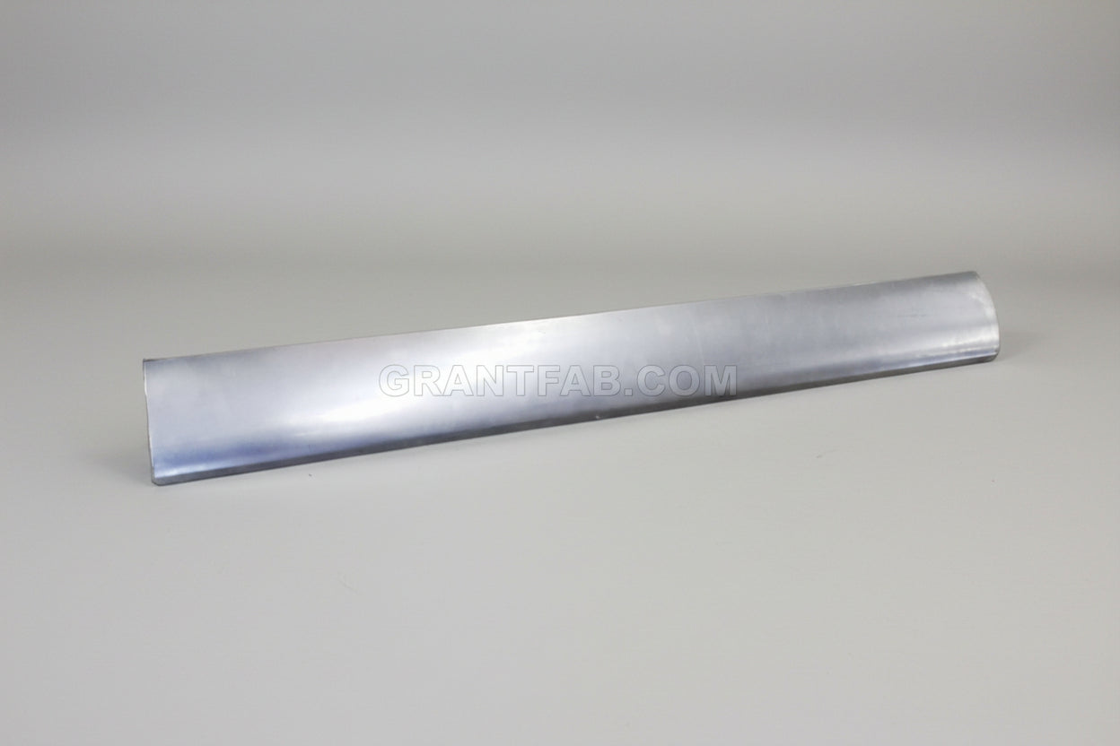 A silver-colored metal roll pan, likely made of stainless steel, with a smooth surface.