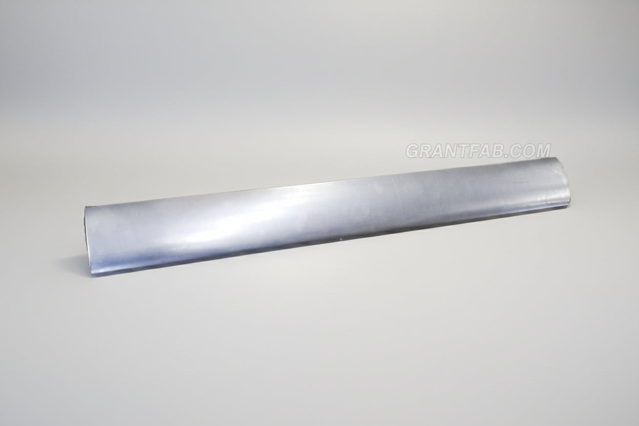 A silver-colored rollpan for a Dodge Dakota vehicle.