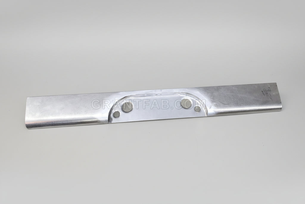 A silver metal rollpan for a Chevy vehicle, with a center box location, appears to be flat and has a smooth surface with visible screws.