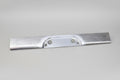 A silver metal rollpan for a Chevy vehicle, with a center box location, appears to be flat and has a smooth surface with visible screws.