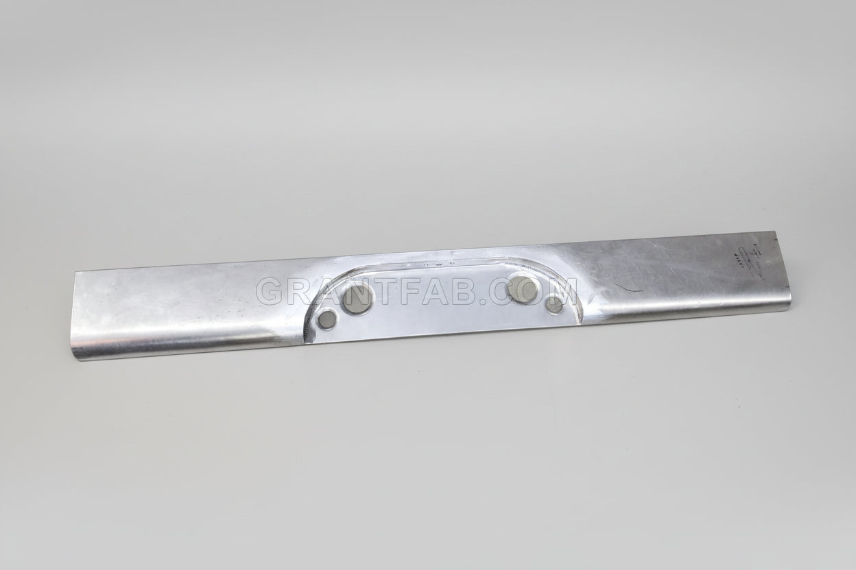 A silver metal rollpan for a Chevy vehicle, with a center box location, appears to be flat and has a smooth surface with visible screws.
