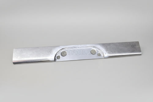 A silver metal rollpan for a Chevy vehicle, with a center box location, appears to be flat and has a smooth surface with visible screws.