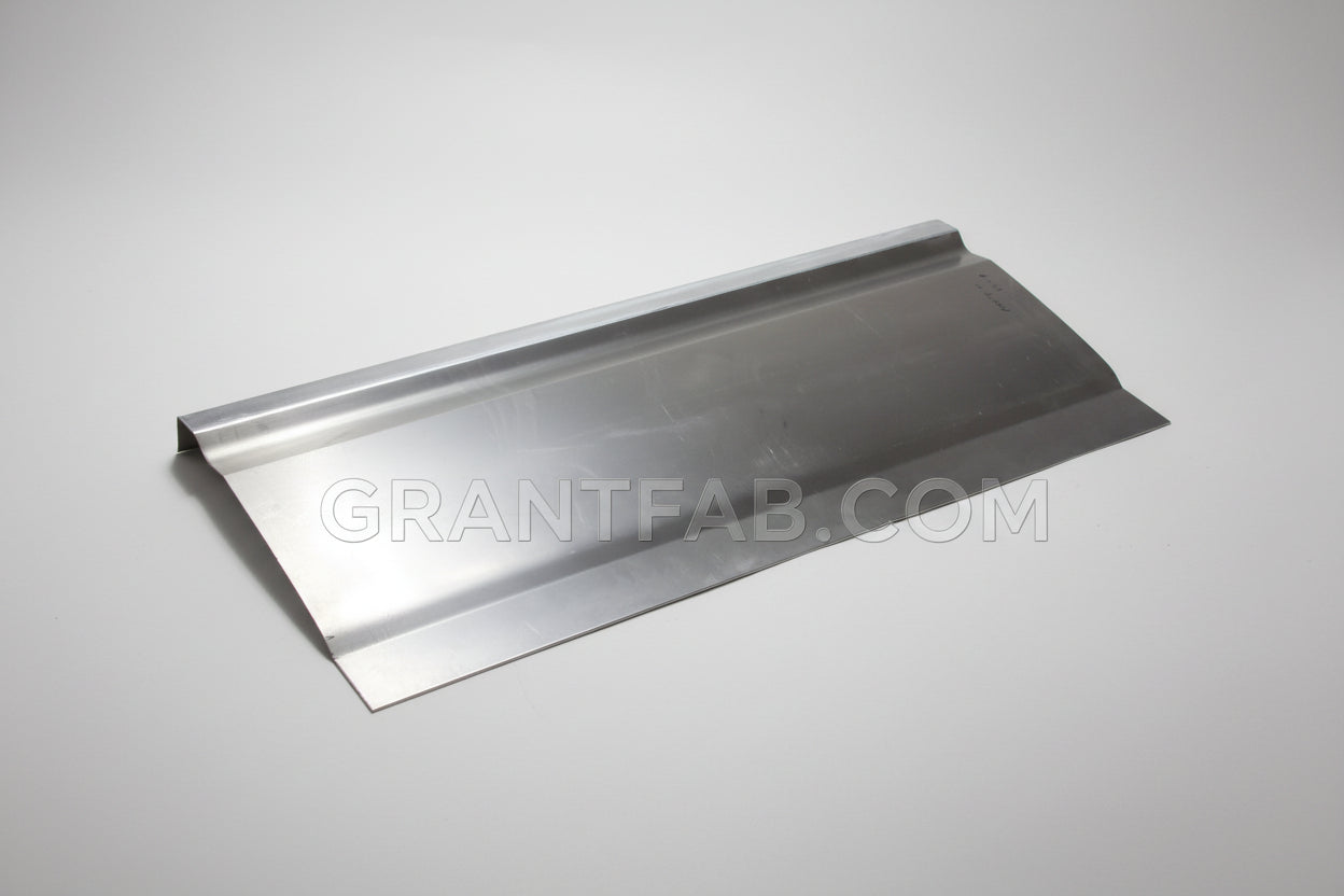 A smooth, silver-colored tailgate skin for a Chevy/GMC truck.