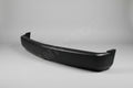 A black full-size bumper for a Chevy vehicle, snug fit