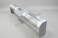 A silver-colored rollpan for a vehicle, made from metal, with a visible seam and weld.