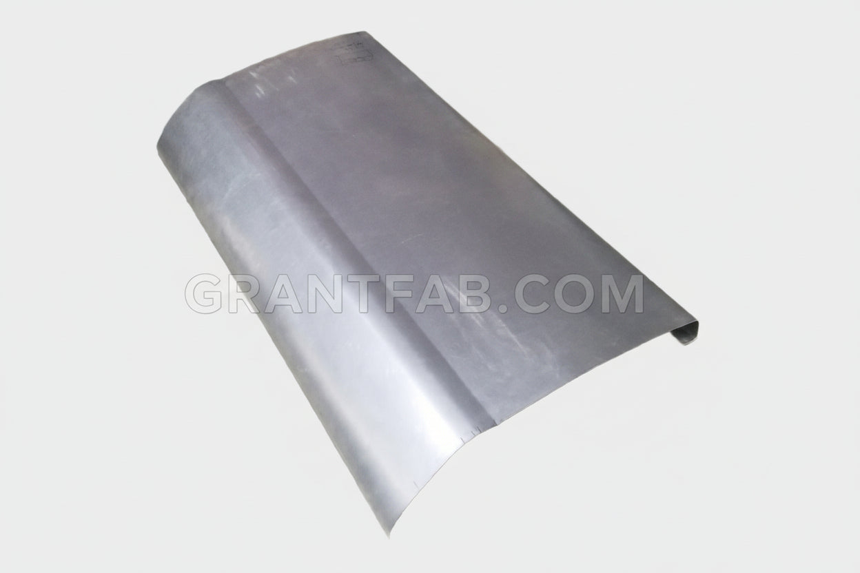 A silver-colored metal auto part, with a curved shape indicating it is designed for use on a vehicle such as a Nissan Frontier.
