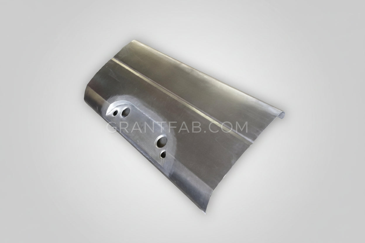 A silver sheet metal auto part with multiple holes, likely a component of a vehicle's body. cal combo
