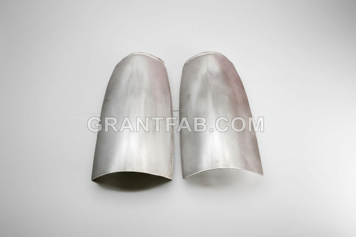 A pair of silver taillight fillers for 88-98 Chevy/GMC vehicles.