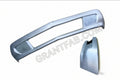Custom silver S-10 truck bumper with scoops and center opening, displayed alongside a separate bumper part.