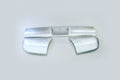 A silver-colored metal roll pan for a Chevy Blazer, featuring a curved shape and weld rear quarters.