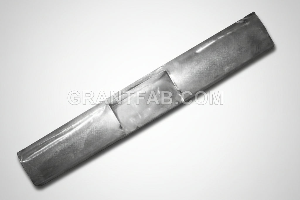A gray metal rollpan designed for a Nissan Frontier vehicle.
