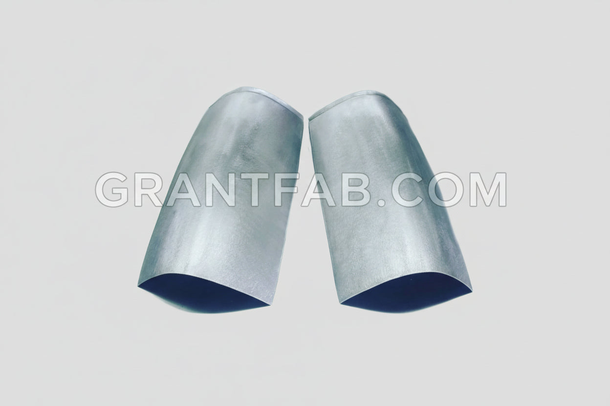 A pair of silver taillight fillers for a Chevy S-10 Blazer.